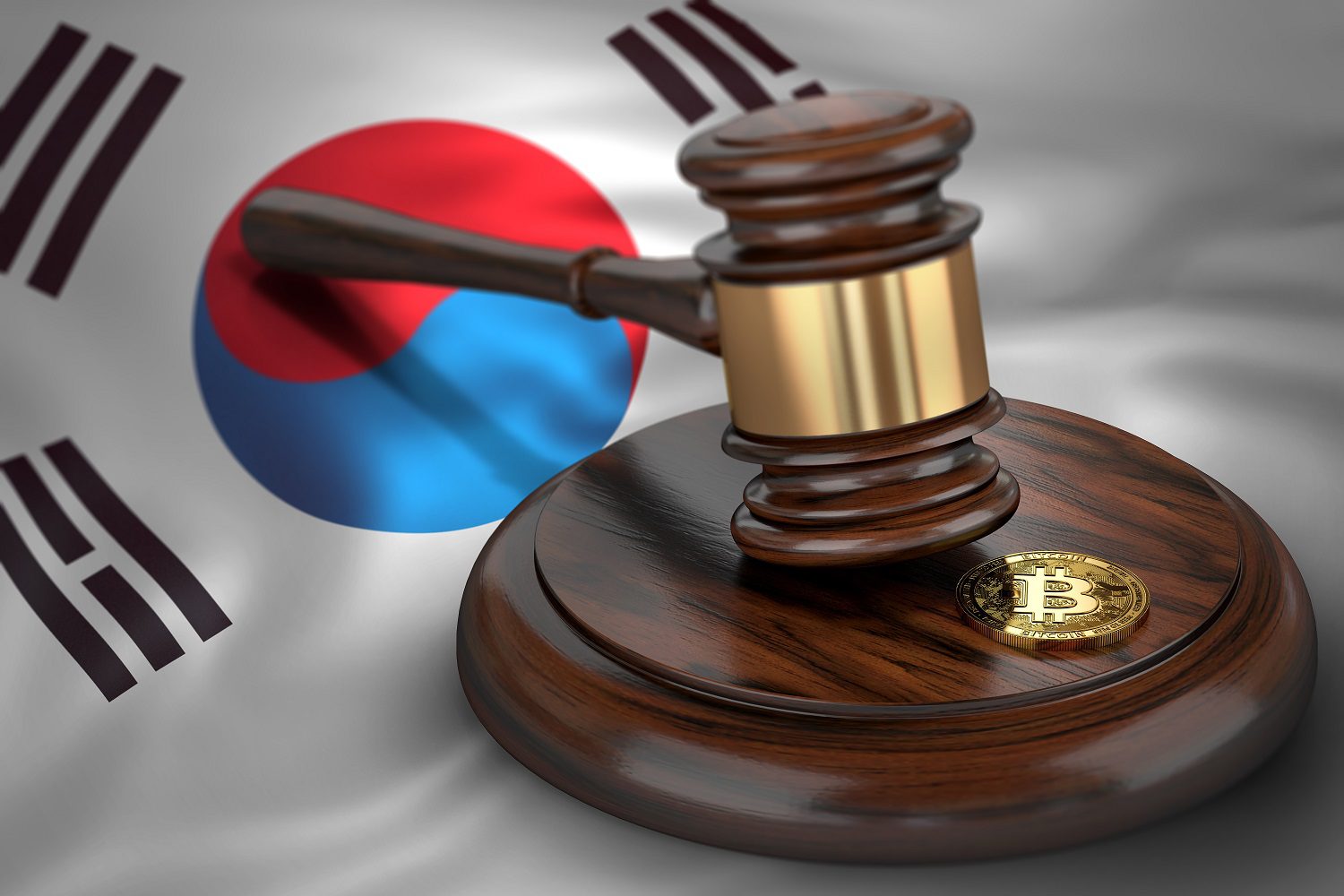 A token intended to represent Bitcoin and a judge’s gavel against the background of the flag of South Korea.
