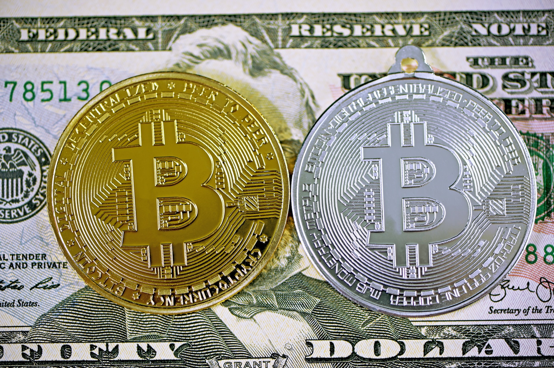 Image of Bitcoin and US Dollar bill